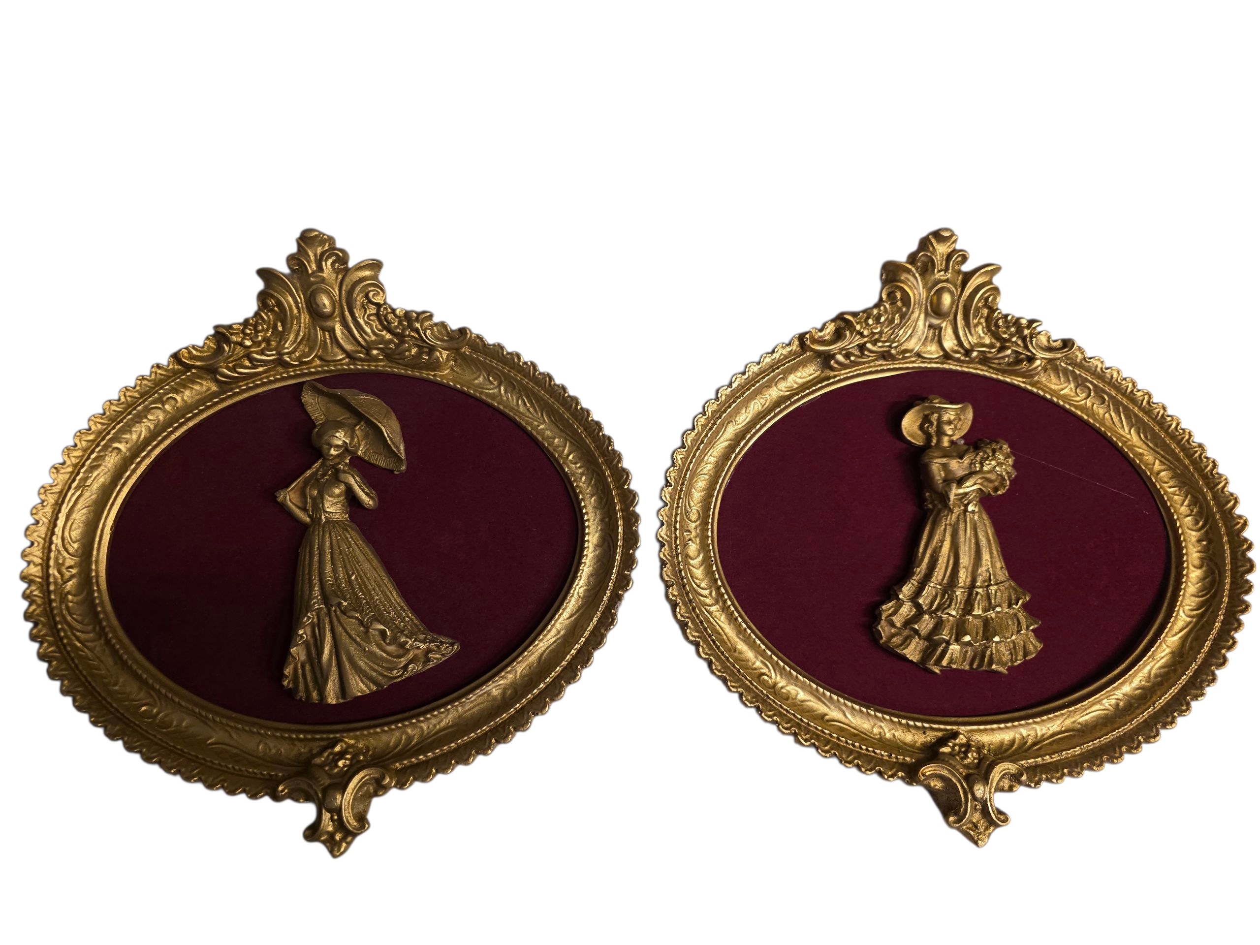 A pair of oval framed medallions