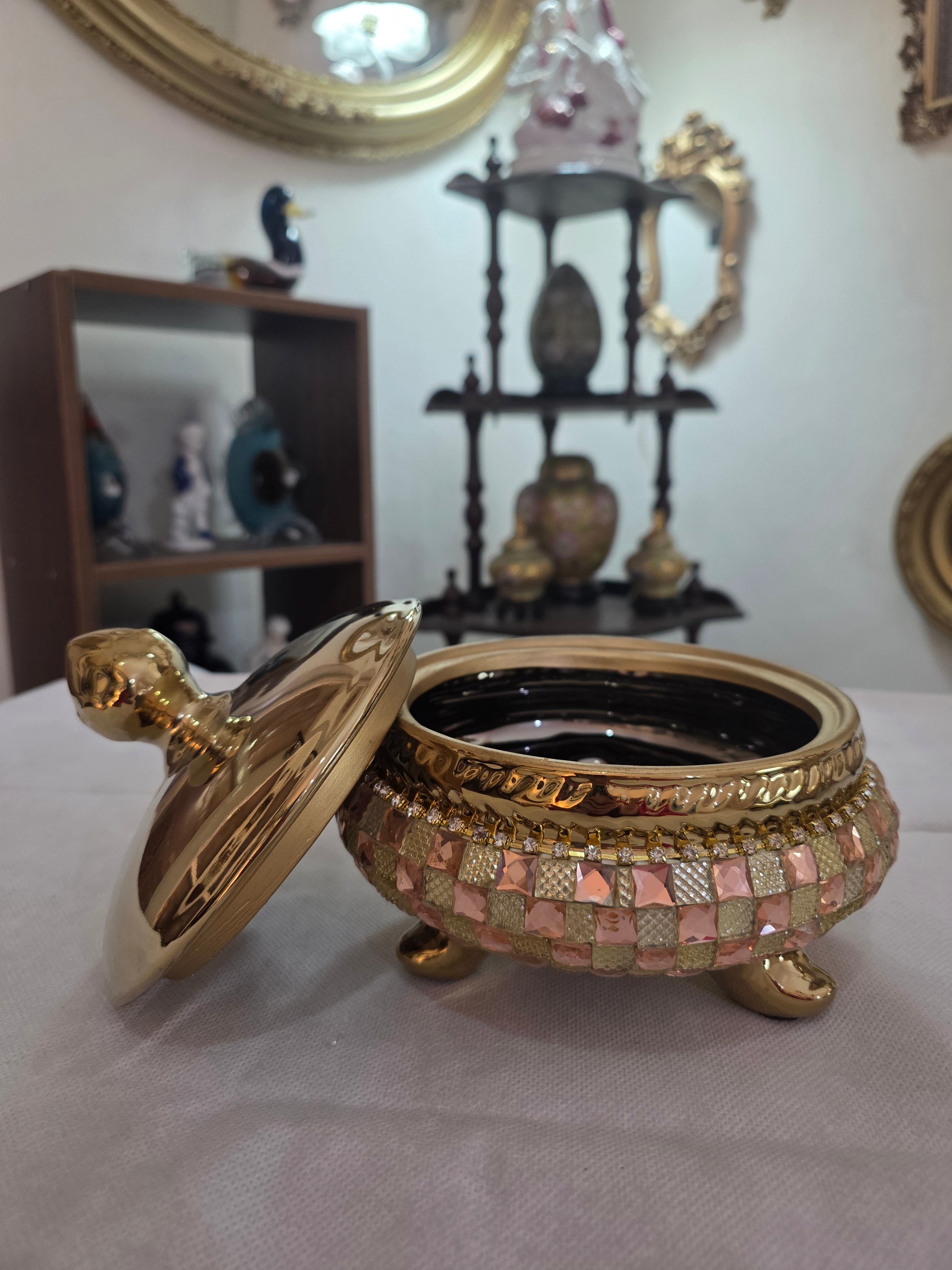 Gold bonbonnière and candle holder set