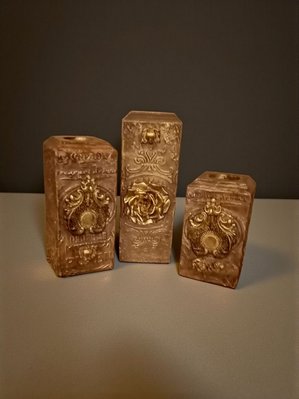 Set of decoupage candle holders