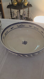Elegant Navy Ceramic Bowl with Floral Motif