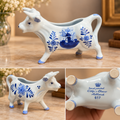 Vintage Hand-Painted Delft Blue Ceramic Cow Creamer with Windmill Design