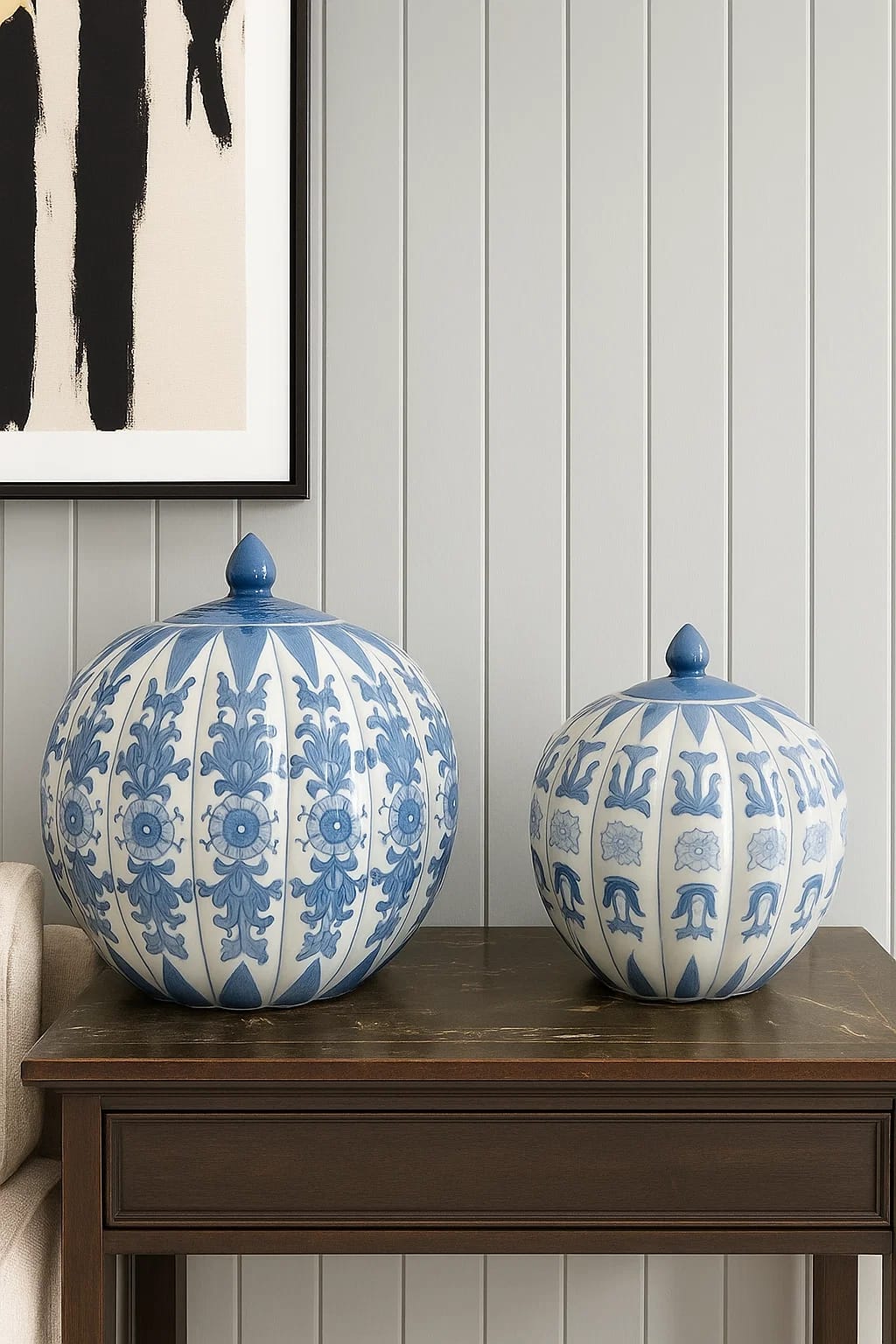 A striking chinoiserie ginger jar with a sculptural, pumpkin-like silhouette. Hand-decorated in...