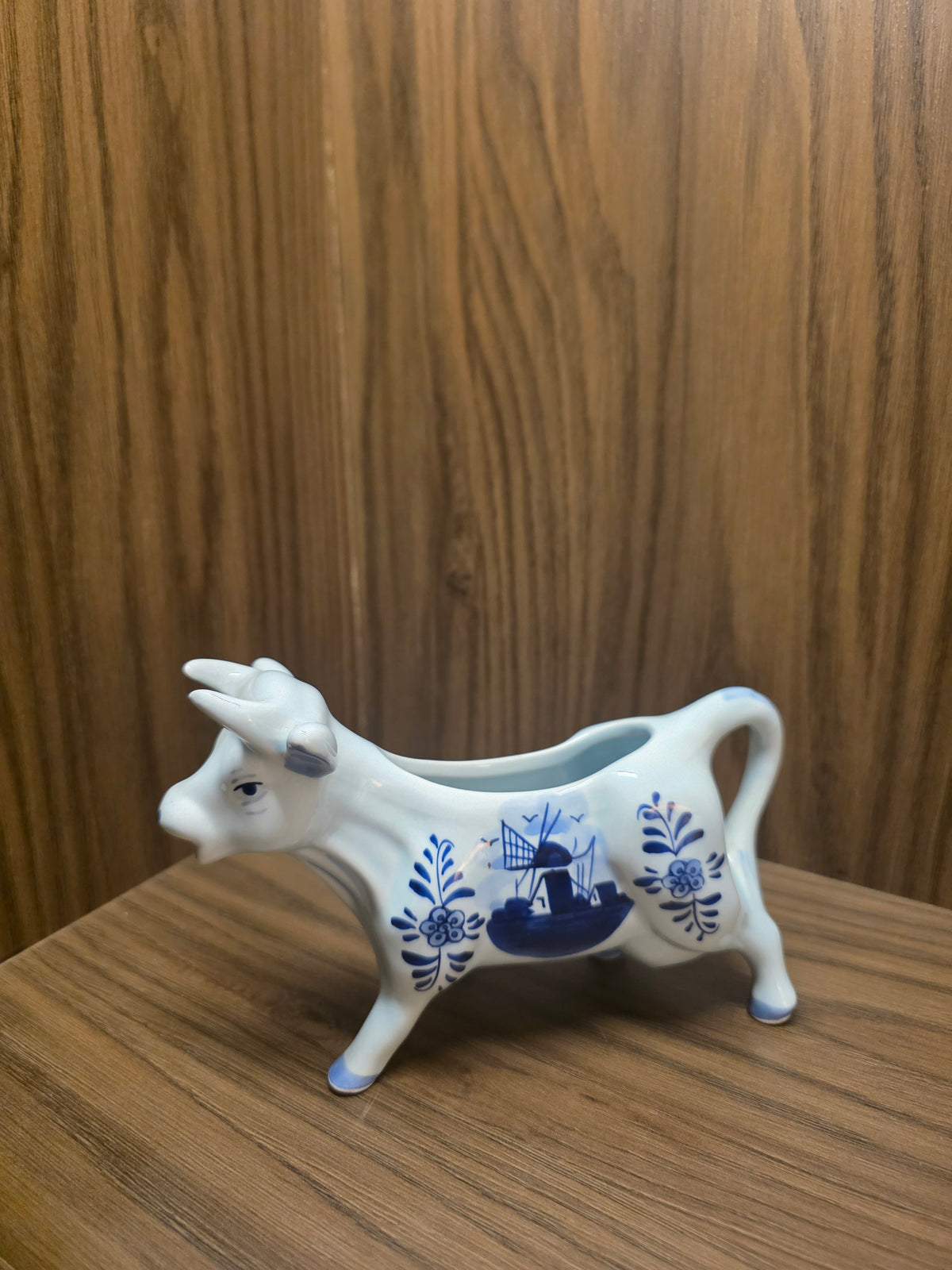 Vintage Hand-Painted Delft Blue Ceramic Cow Creamer with Windmill Design