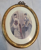 Victorian Elegance in Gilded Oval Frames