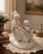 Neoclassical White & Gold Porcelain Mother & Child Statue, Boy with School Bag