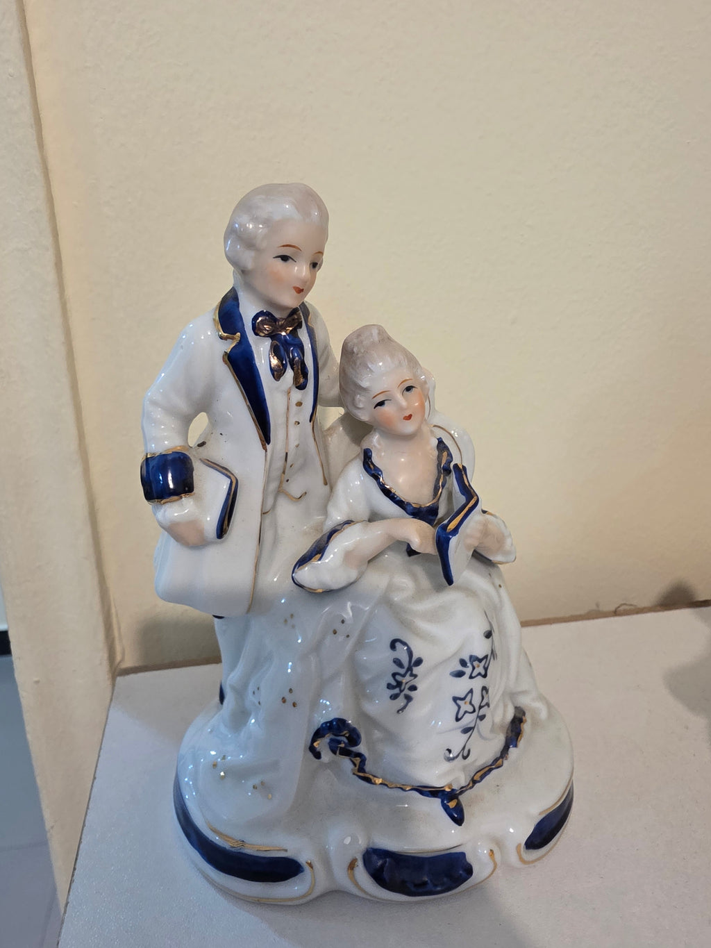 Mid-Century Rococo Style Porcelain Colonial Couple Statue with Gold Accents