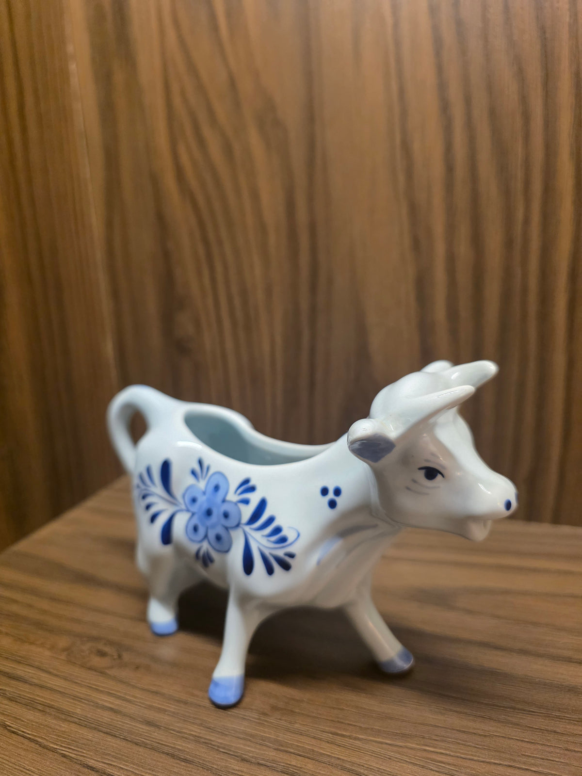 Vintage Hand-Painted Delft Blue Ceramic Cow Creamer with Windmill Design