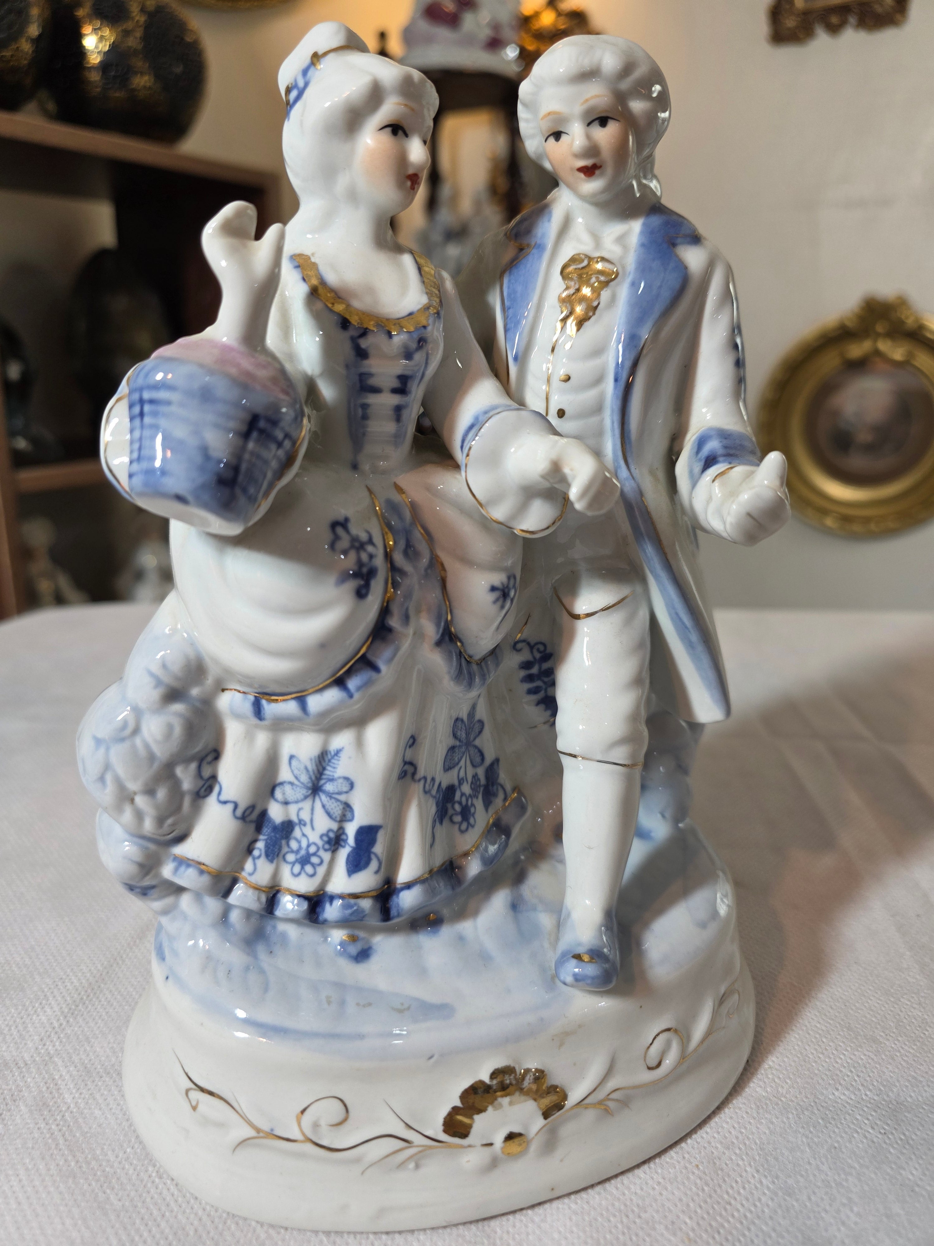 Baroque style porcelain figurine